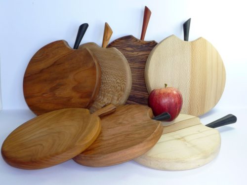 Hand made hand cut single piece wooden chopping boards with stalk detail in selection of woods