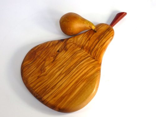 Handmade hand cut pear shaped chopping board Olivewood with stalk detail pink ivory wood